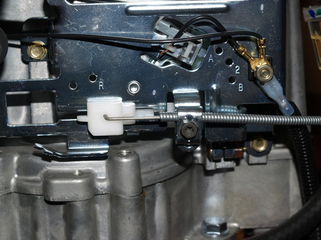 Attach throttle cable to the engine